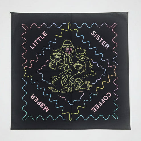 Screen printed design on blue fabric with text and character illustration.